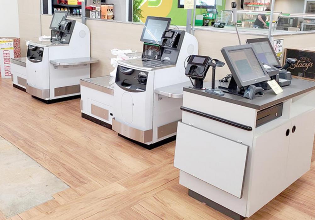 Buche Foods recently installed self-serve check-out kiosks to their Gregory store. Regular check-out lanes are still available, however, for customers who prefer personal service or who aren’t daring enough to use self check-out.