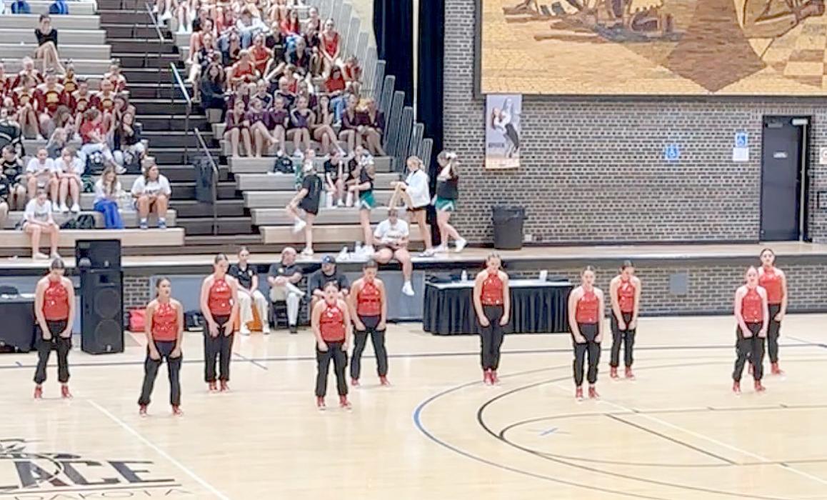 Cheer and dance team goes up against big schools at Corn Palace