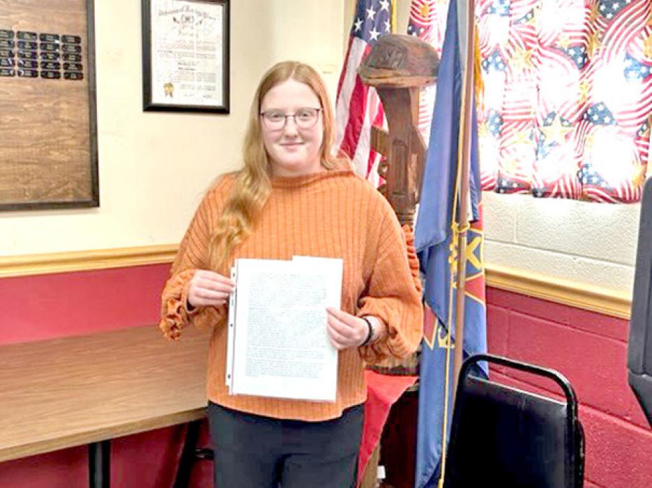 The left picture shows winners of the Patriots Pen Essay; Brielle Cahoy, 2nd place, (left,) and Hattie Hausmann, 1st place (right,) and Beckem Bauld, 3rd place (not pictured.) Emma Kellen, shown in the right picture, was the winner for the Voice of Democracy Essay.