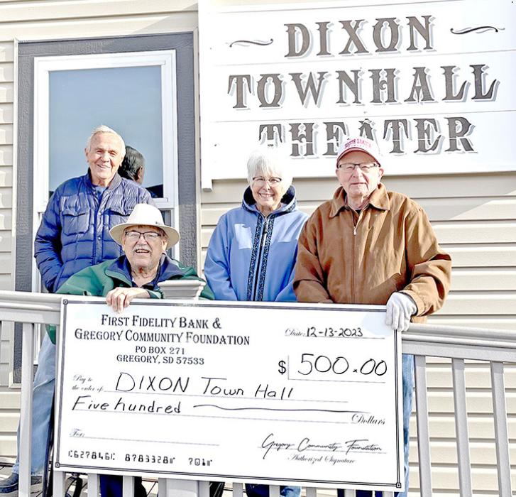 The FFB and Gregory Community Foundation board members, front, Jeff Johnson and Emmett Kotrba, presented a check for $500 to back, Dr. Jerry and Bette Fogel. The funds will be used to assist with improvements to the Dixon Townhall Theater.