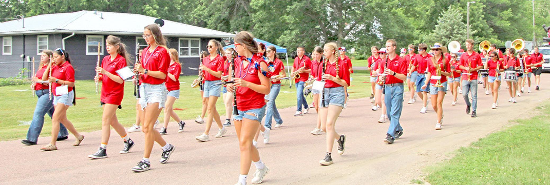 The Gregory High School marching band roused the crowds with patriotic music.