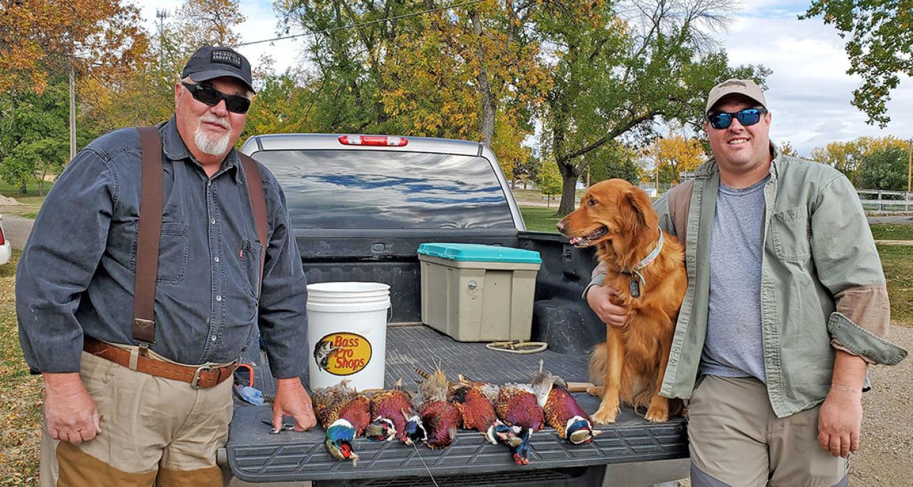 Opening weekend of pheasant season can be summed up in one word - windy. But despite the less than favorable conditions, most hunters were able to get their limit in a reasonable amount of time. These two hunters from Springfield, MO, who have been hunting in the Gregory area for years, were happy with their haul.