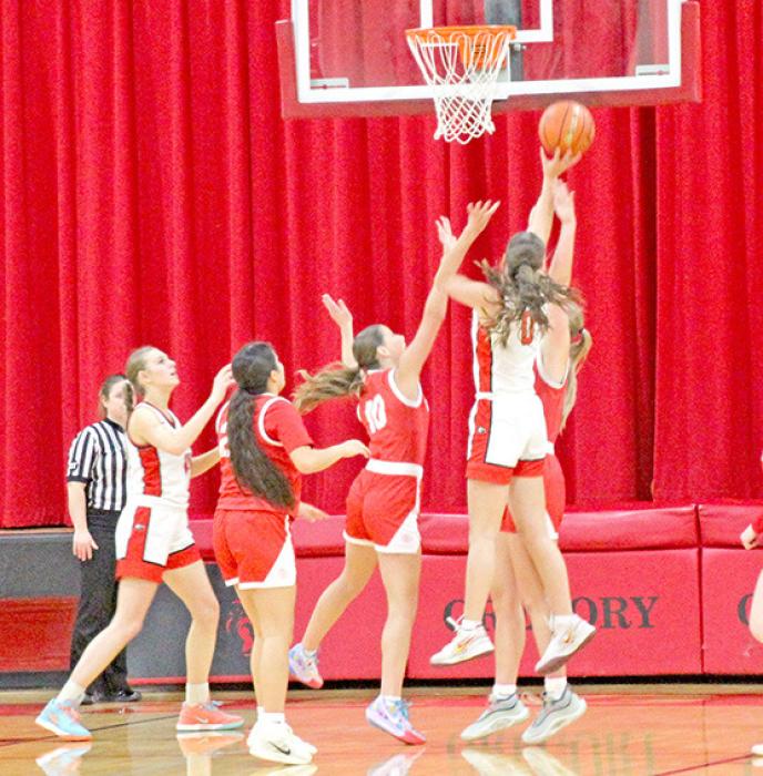 Regan Graesser soars above a field of players in Gregory’s win against Chamberlain on January 21, 2025. Graesser finished the day with 22 points to lead the team in scoring.