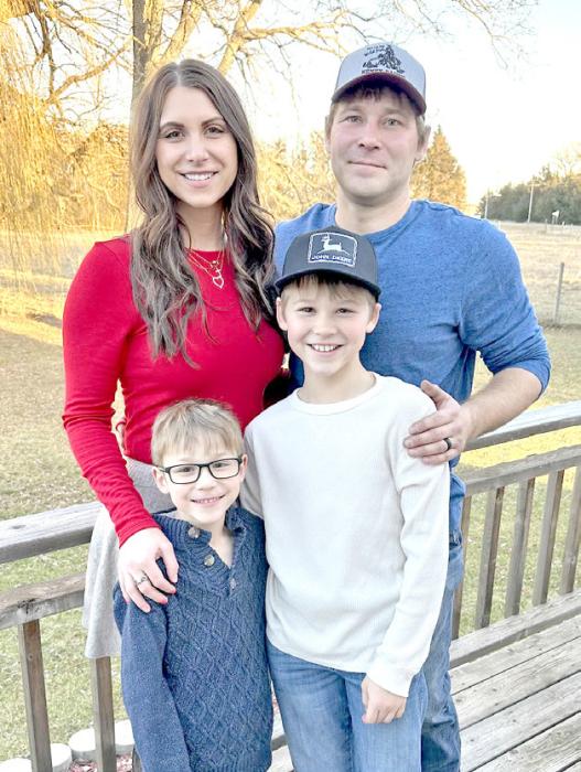 Joe Beck, of Beck Excavation &amp; Utilities, is shown here with his wife Erin and their two sons, Layke, l, and Jace, r.