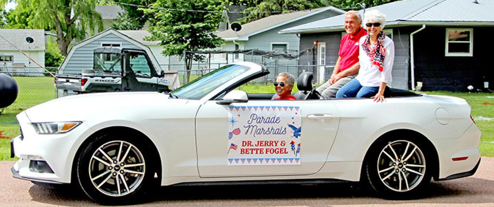 Dr. Jerry and Bette Fogel were decked out in patriotic colors to lead Gregory’s parade through town.