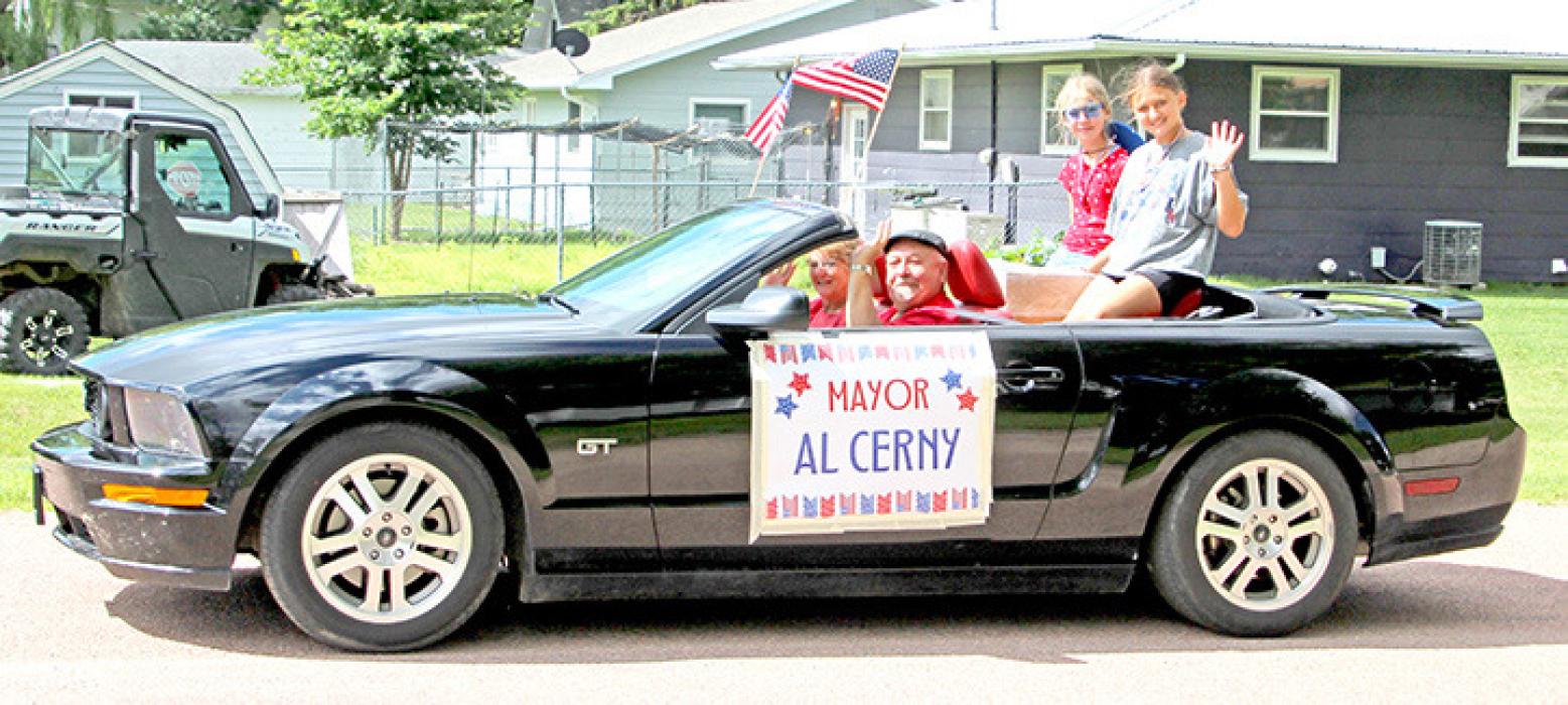 Mayor Al Cerny had Addyson DuFrane and Mya Warnke joining him on the back of his convertible for the parade to throw out candy.
