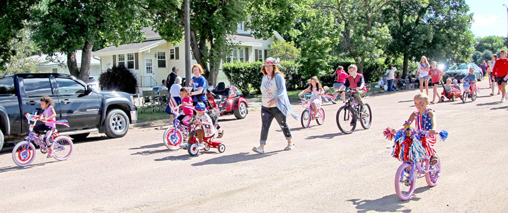 Sporting patriotic decorations and apparel, kids of all ages made their way through the kiddie parade.