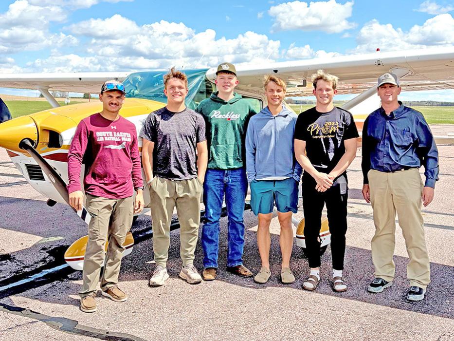 GHS graduate Luke Murray (left) and instructor Brent Combs (right) brought their planes for the GHS aviation class. Students are, l to r: Dale Smikle, Matthew Smith, Lincoln Juracek, and Mason Janak.