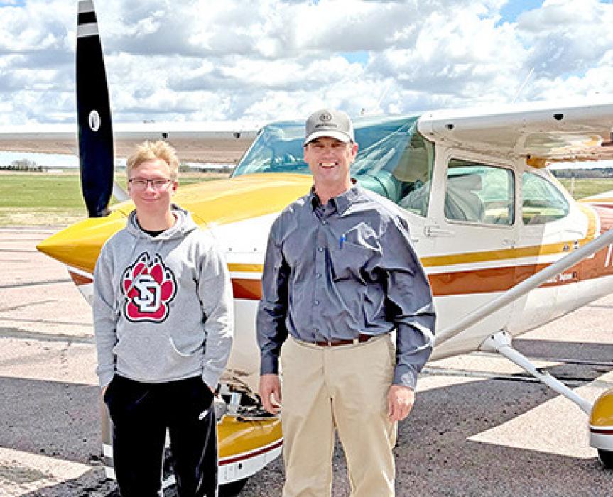 Students not pictured with the group are, Pierce Stukel (in the plane), and Dylan Johnson with Brent Combs.
