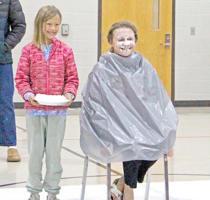 The second $1,000 raised put Superintendent Sara Anderson in the hot seat as a face pie recipient at the hands of Emery Shoemaker.