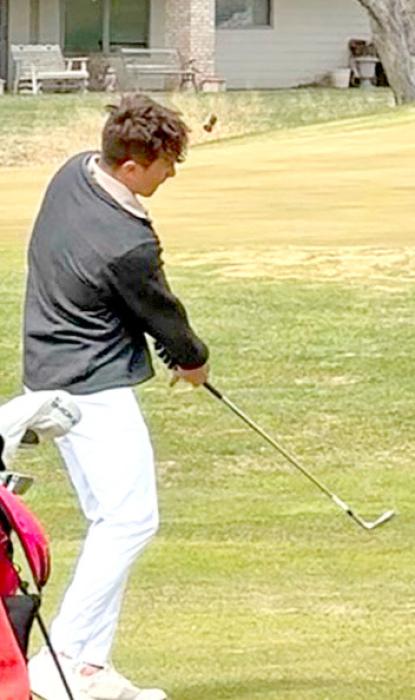 Luke Stukel chips the ball at the Fox Run Golf Course in Yankton on Thursday, April 17, 2025.