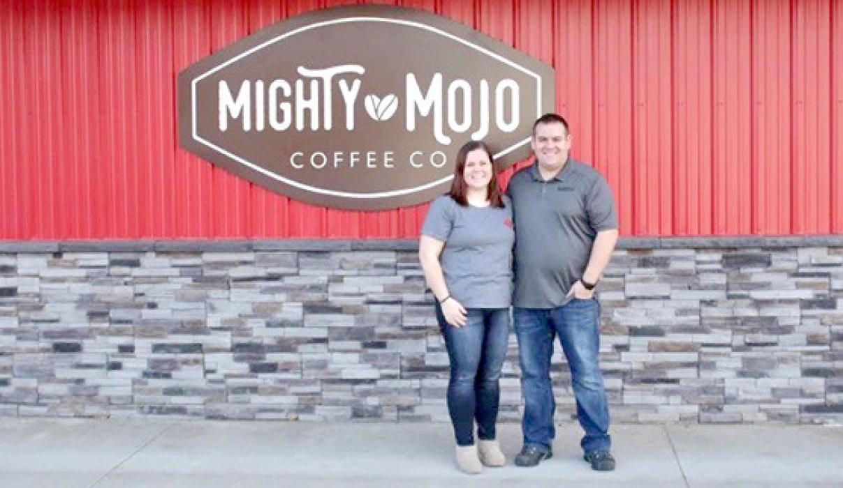 Trisha and Dan Cahoy stand outside Cahoy’s General Store in Lake Andes. The couple was recently awarded South Dakota Retailer of the Year for their commitment to customer service and community engagement. (Photo by Jennifer Leither / Mitchell Republic)