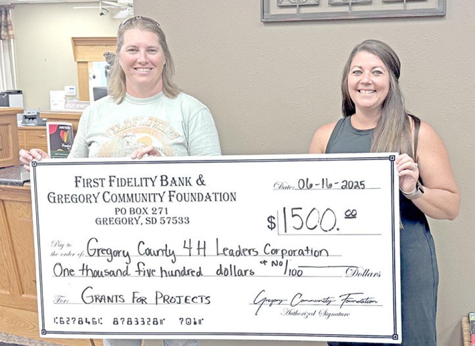 Mollie Andrews, representing Gregory County 4-H leaders, left, received a $1,500 grant to help build livestock facilities for the 4-H program. Aliza Wonnenberg, right, is representing the First Fidelity Bank &amp; Gregory Community Foundation.