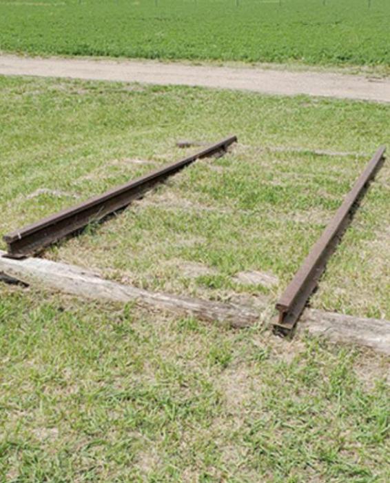 A section of track from the Chicago Railroad that arrived in 1906 is still intact in the lawn.