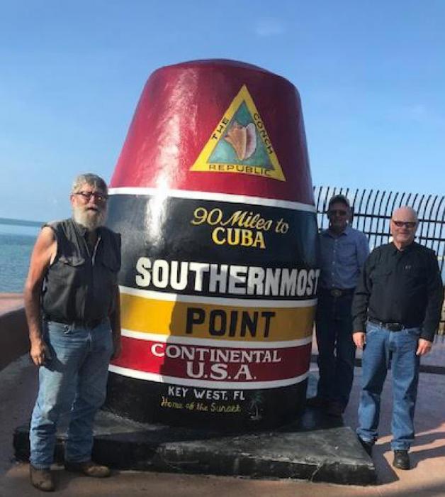 Anderson, Keith Swedlund, and Jim Selle, shown l to r, stopped to pose for a photo at the southernmost point of the United States in Key West, FL.