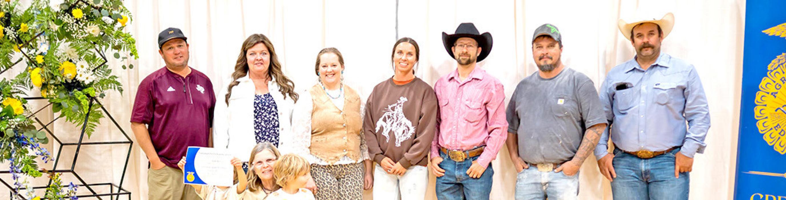 Members of the Burke Riding Club who were in attendance to receiving their Honorary Chapter Degree were, l to r: Jessy Biggins, Kim Petersen, Kendra Kahler, Sara Koupal, Joey Koupal, Jake Imhof, and Seth Andrews; Renee Sutton is in front with Lake and Lou Sutton. (Submitted photo)