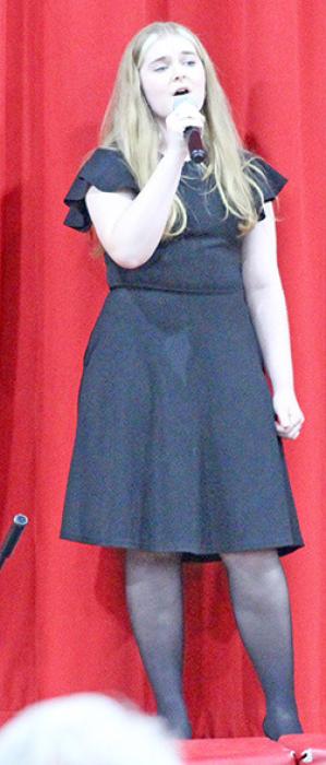Ellie Van Kirk entertained the crowd as she sang Think Of Me by Webber, Hart &amp; Stilgoe.