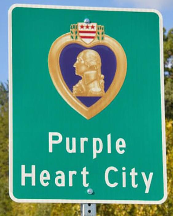 Three signs similar to this one will be installed at the three highway entrances to Gregory, designating the city as a Purple Heart City.