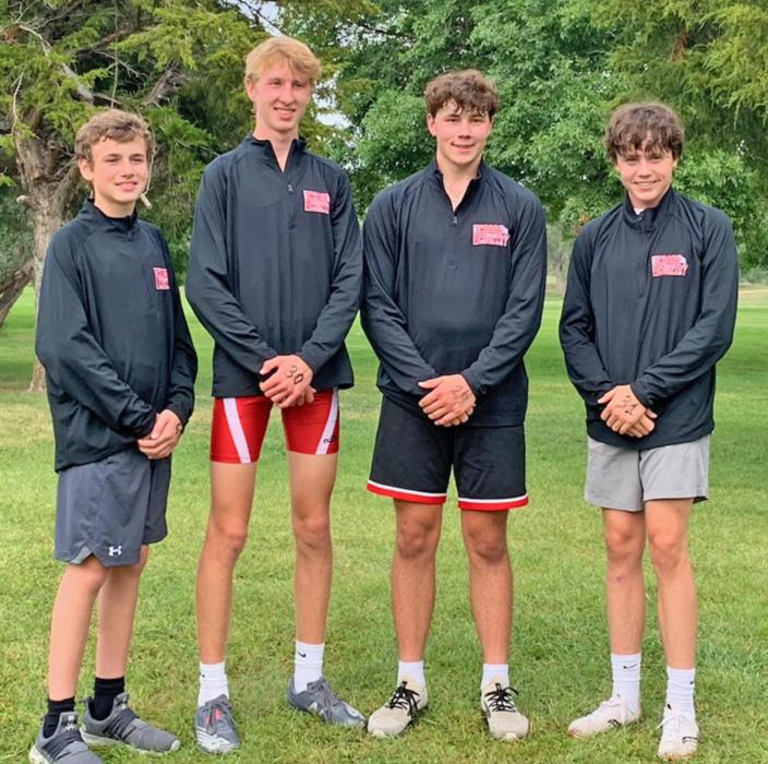 Gregory Gorillas varsity boys took runner-up at the Wagner Invite. Ryler Stevicks, (left) ran in the boys middle school division and ended up with a second place finish. Varsity boys are pictured from l to r: Luke Sinclair, Carson Klundt, and Pierce Stukel.