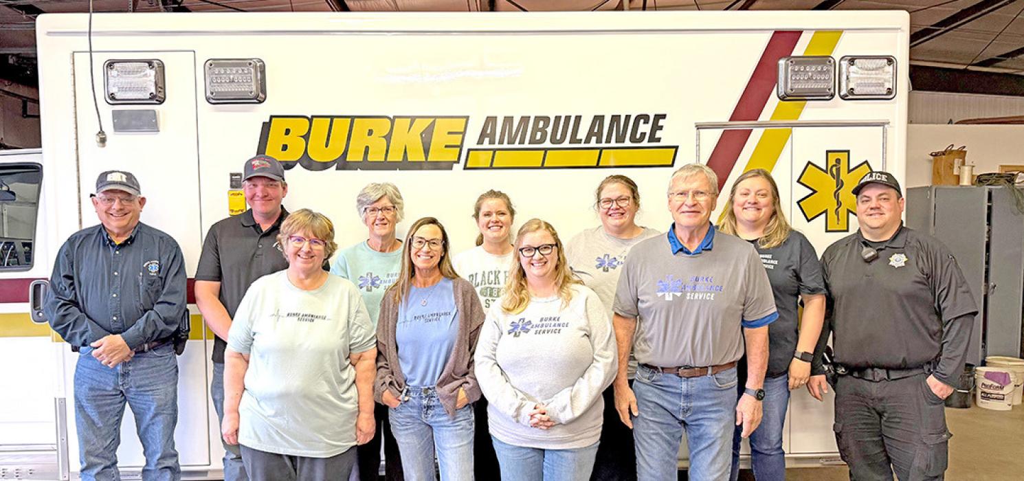 Burke Volunteer Ambulance crew members are pictured back row, l to r: Mike Green, Nathan Johnson, Charlene Juran, Madison Whalen, Nicole Harnack, Ashley Kass, and Mark Green. Front row, l to r: Tami Hotz, Trisha Story, Natasha Martin, and Mel Juran.