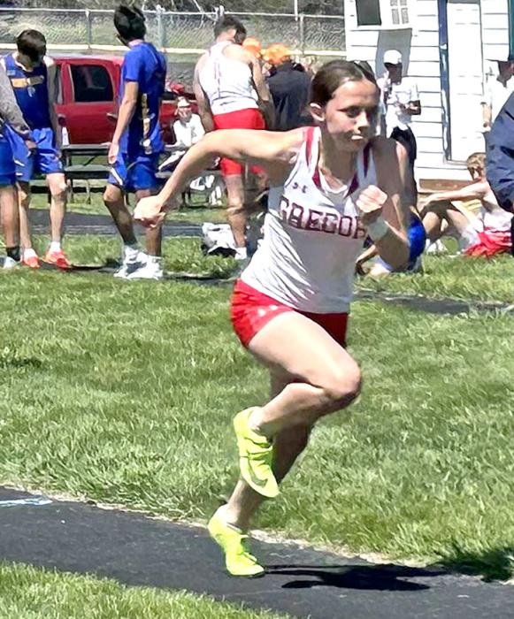 Abbigail Holmes ran a personal best time in the 100 meter dash for a tenth place finish in Burke. (Photo by Amber Bunker)