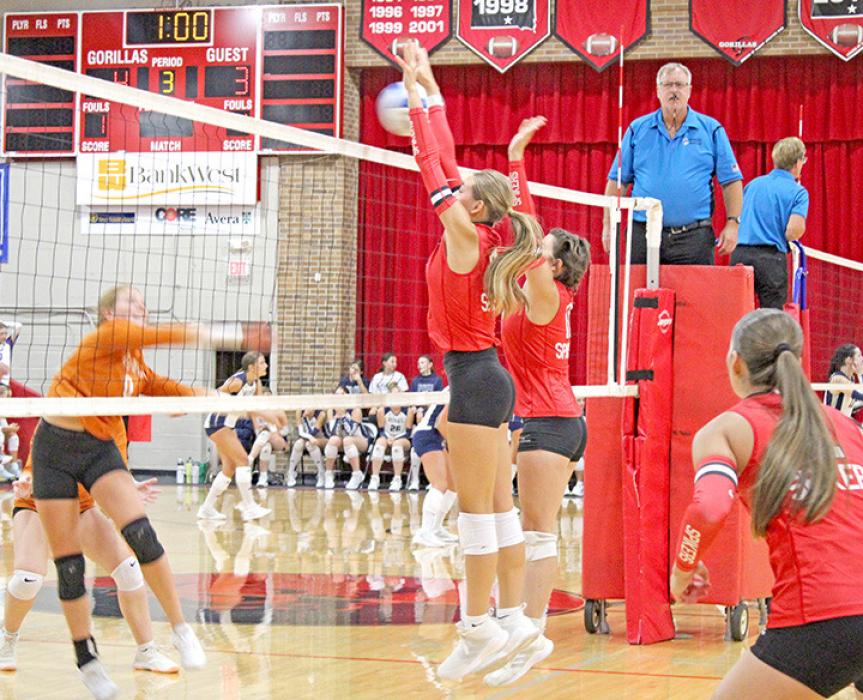 Asia VanDerWerff blocks the ball in Gregory’s five-set victory over Lyman on Thursday at home. (Photo by Madi Graber)