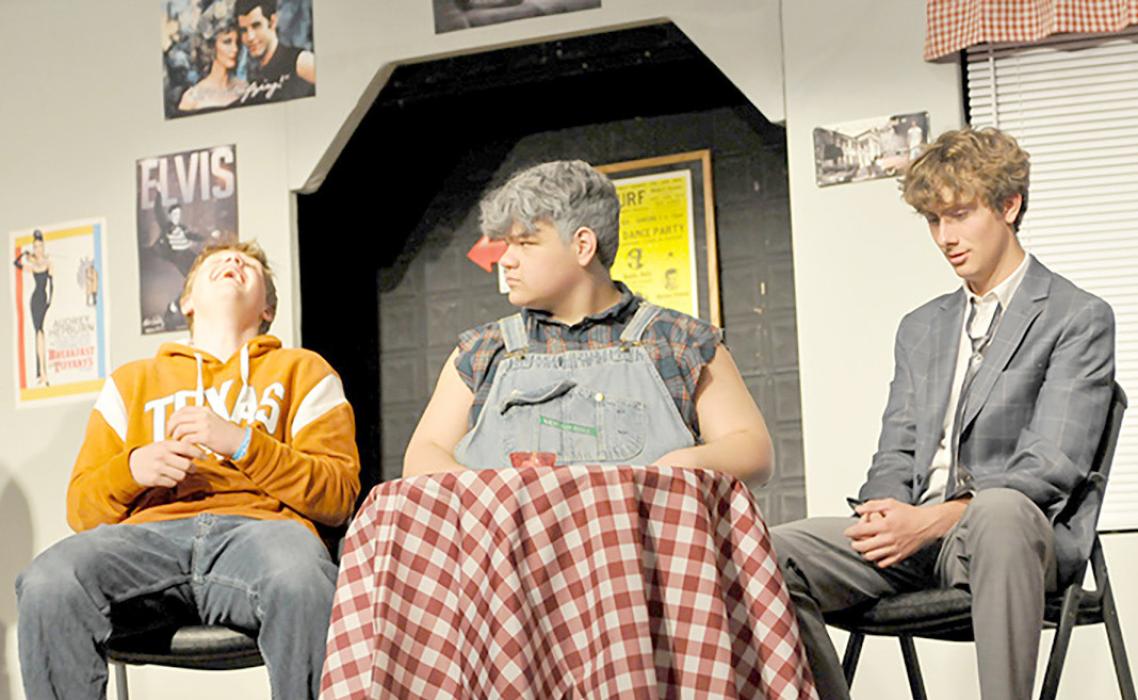 Cody, (r) played by Isaac Hull, just confided to his friends, (Eli Barreto and Bo Brozik) much to their amusement, that he accidentally proposed to his girlfriend in the Gregory High School production of “Scrambled,” performed Friday and Saturday evenings at Dixon Town Hall Theater.