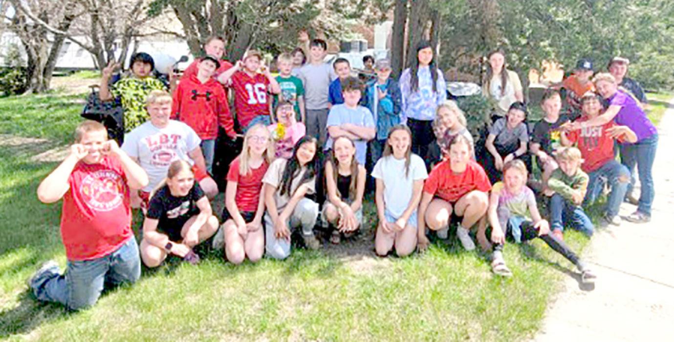 Each year, teacher Mark Braun leads each class in completing service projects around town with the intention of leading them to show appreciation to the community that gives them such strong support. The following pictures are just a sampling of the projects completed this year. The 4th graders were tasked with sprucing up the parking lot and grounds at the school.