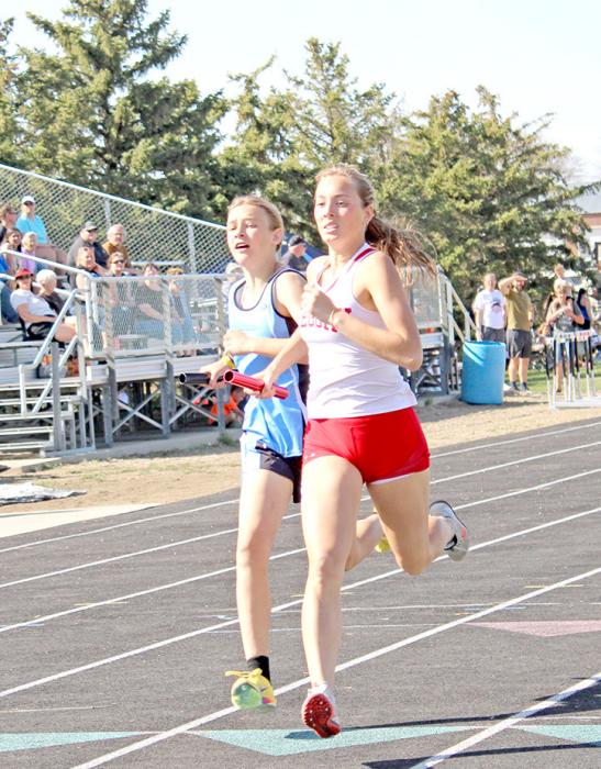 Asia VanDerWerff edges out the competition in the 4x100 relay. (Photo by Adyson Stukel)