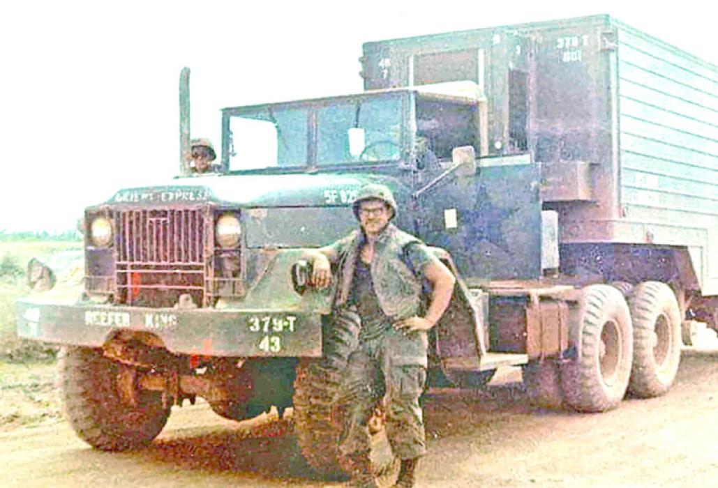 Doug Lindquist is shown here with the refrigerated truck he drove during his tour in Vietnam. (Submitted photo)