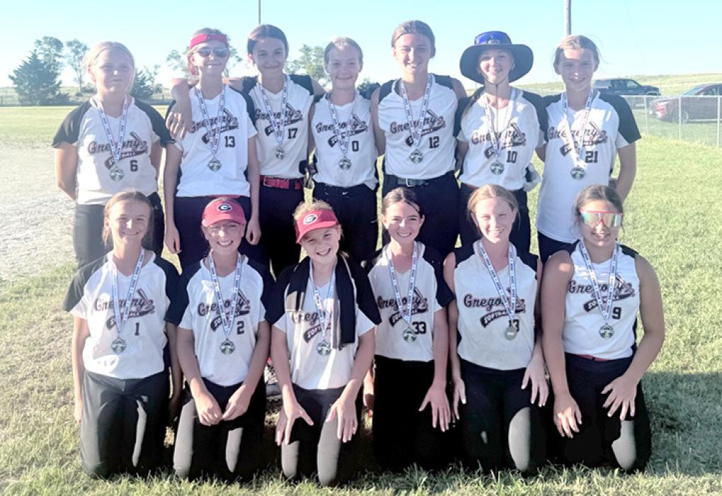 The 12u girls softball team placed 2nd in the Clearfield tournament on Sunday, July 5, 2026. Back row, l to r; Nevaeh Pore, Hannah Hull, Avaya Vomacka, Mya Warnke, Addyson DuFrane, Mayme Reber, and Avery Stukel. Front row, l to r; Meadow Wonnenberg, Sutton Braun, Rowan Wenger, Hailie Lutt, Lydia Wonnenberg, and Kareen O’Connor.