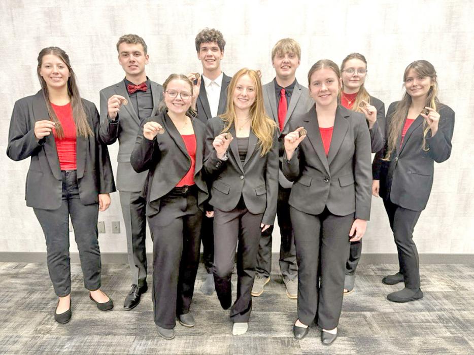The entire oral interpretation team is moving on to regions. Back row, l to r: Ella Sperl, Ryler Stevicks, George Timanus, Bo Brozik, Charissa Ring, and Piper Bartlett; front row, l to r: Madi Graber, Mia Haines, and Dani Timanus. (Submitted photo)