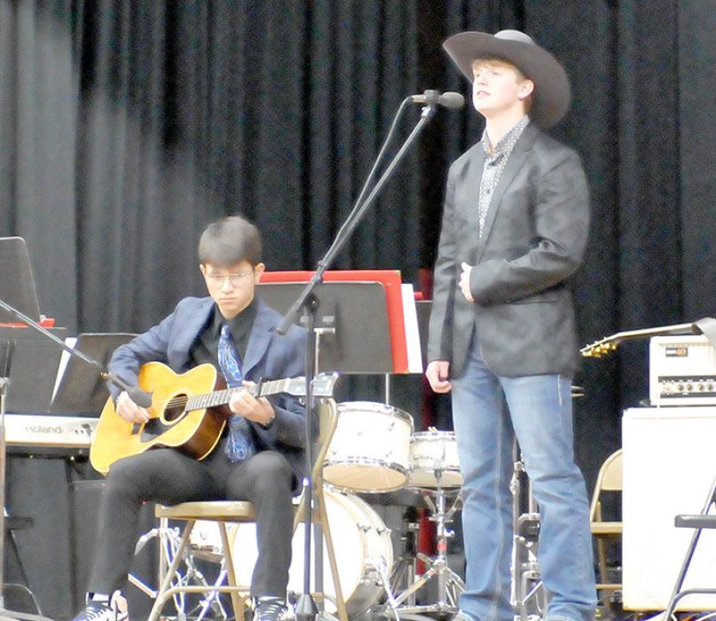 Bo Brozik and Luke Barreto on guitar performed Beneath Oak Trees by Dylan Gossett.
