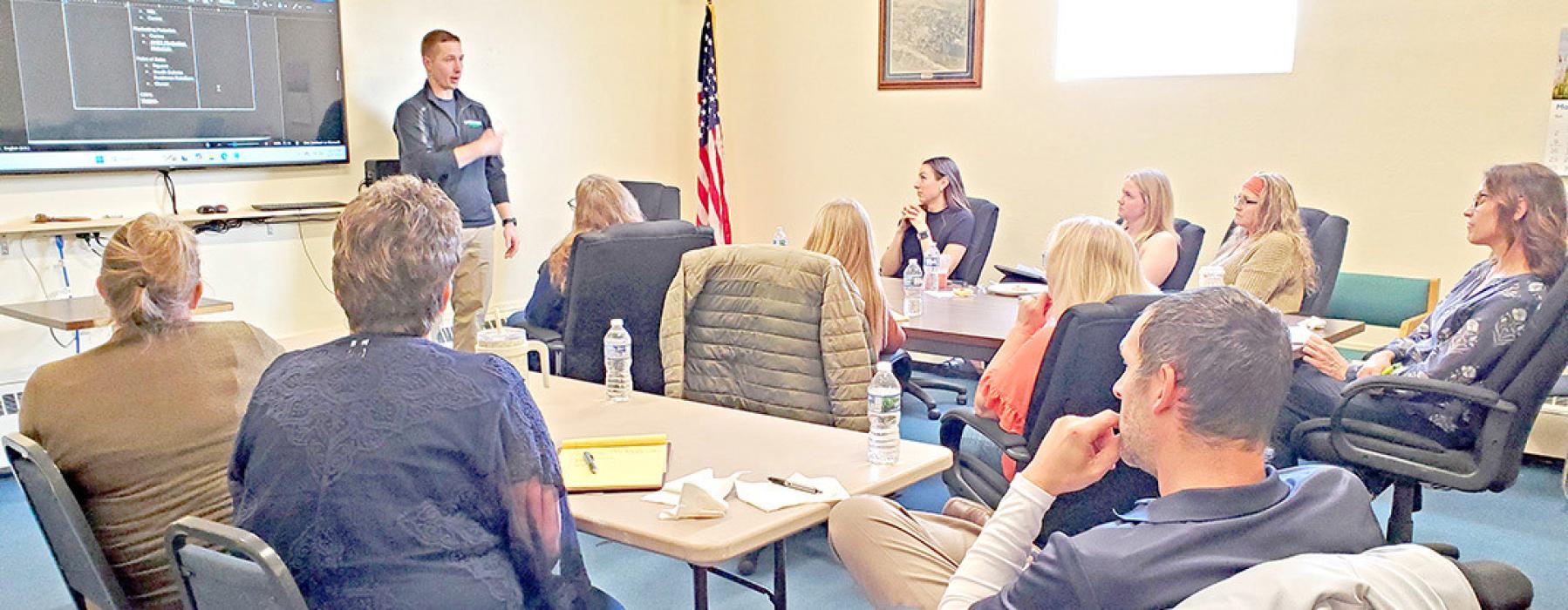 The Gregory/Dallas Chamber of Commerce hosted their first Lunch &amp; Learn workshop for Chamber members on Thursday, March 27, 2025. Cole Nicholas of Cybertec is shown here conducting the training on the many features of Microsoft Office 365.