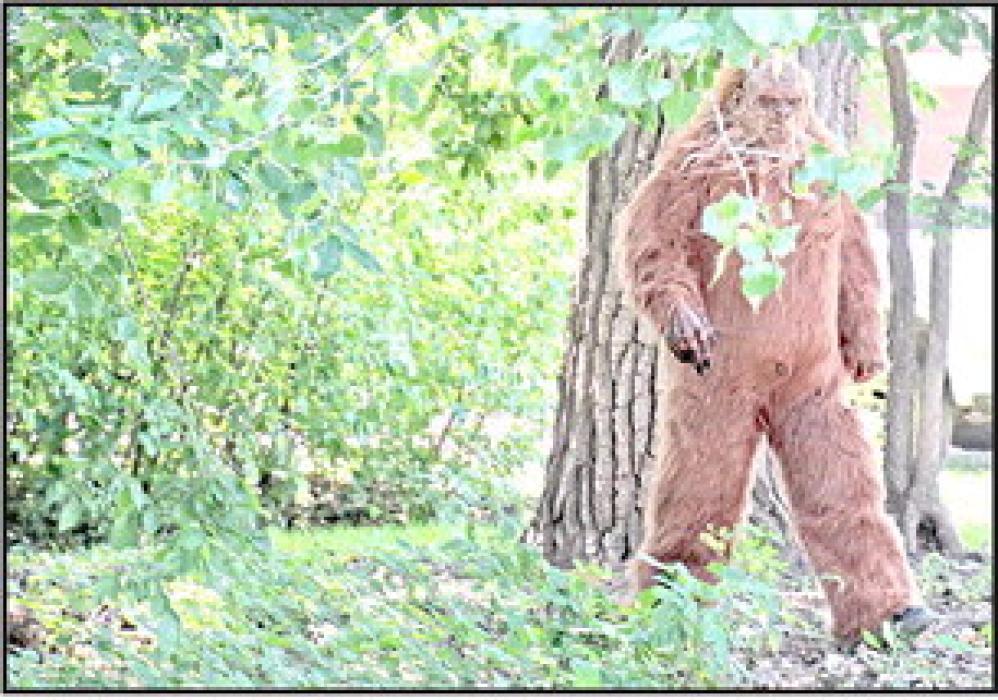 Larry Firecloud dresses as Bigfoot to emphasize Rescues Unlimited’s commitment to rescue all animals, maybe even Bigfoot.