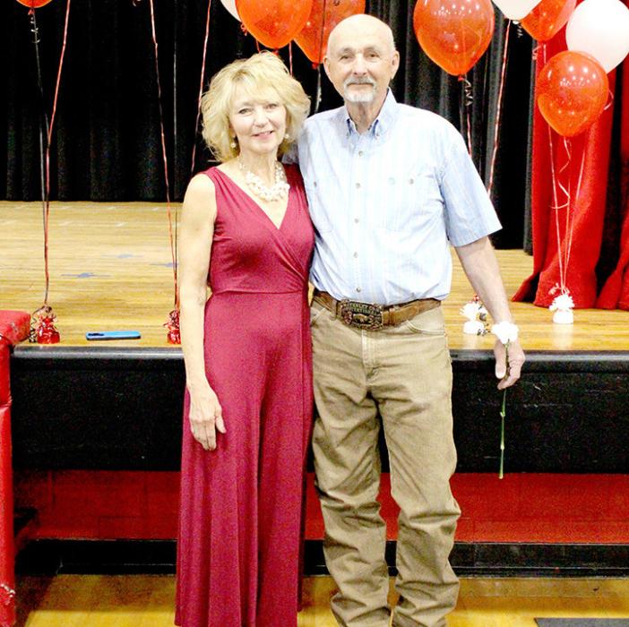 Mr. John Hansen, shown here with his wife Cheri, retired this year after 50 years of teaching and coaching. He was honored for his many years of service and dedication to the Gregory School District at the graduation ceremony on Saturday.