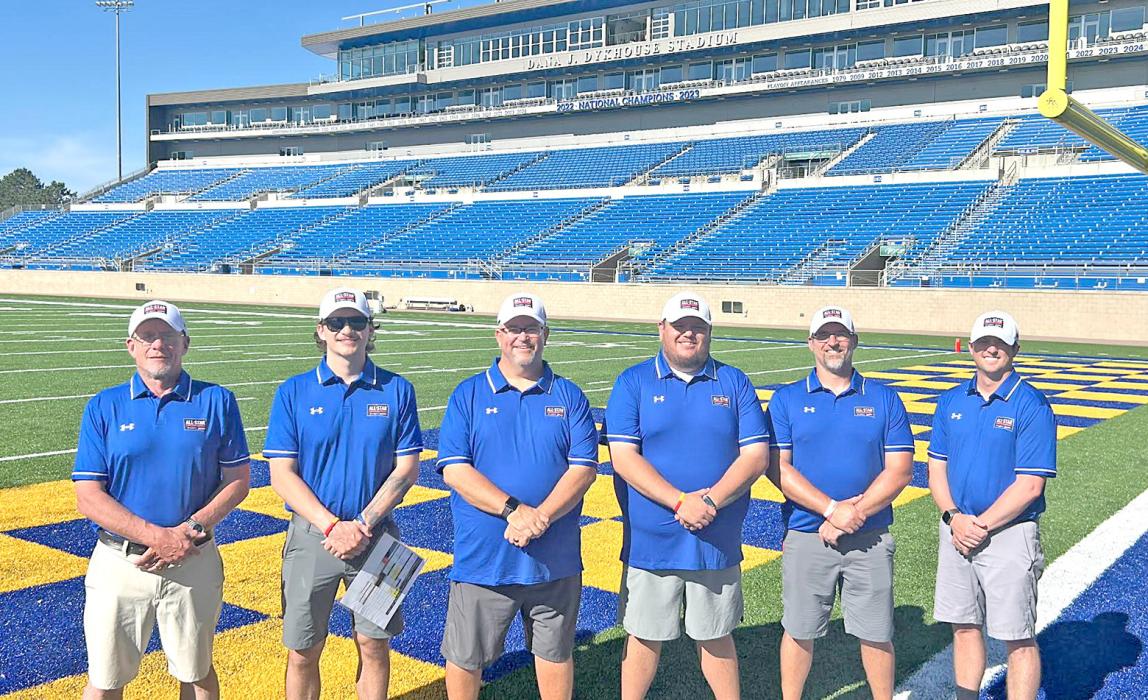 Coach John King, far left, is shown here with the rest of the Blue team coaching staff for the All-Star game. (Submitted photo)