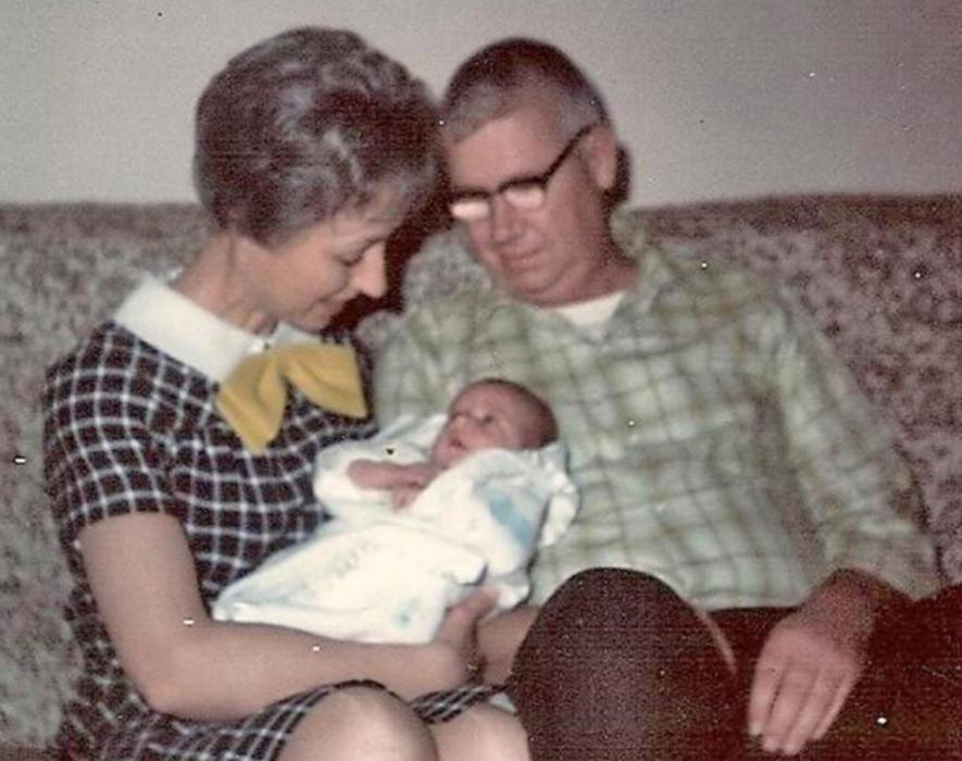 These are my parents holding my youngest brother, who is a little over a week old here. They brought him home on Halloween. Later they joked that they got a trick instead of a treat.