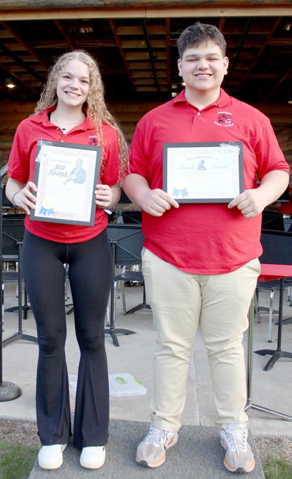 Seniors Eli Barreto, right, and Kaydence Klein, left, received the John Philip Sousa and Louie Armstrong awards, respectively, for their outstanding achievements in concert band and jazz band.