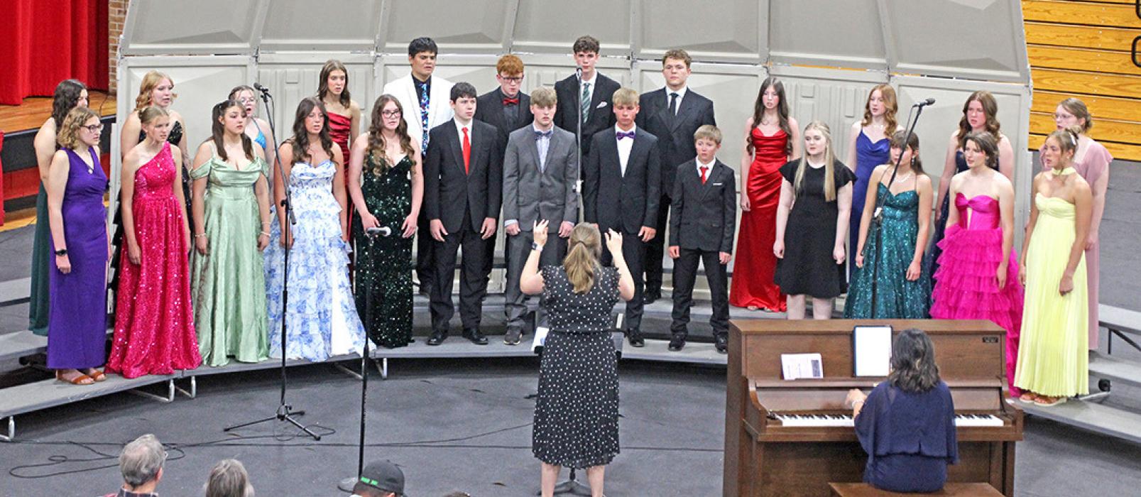 The 8va Select Choir performed three selections, beginning with Gloria in Excelsis by Greg Gilpin. (Photo by Ashley Lozano)