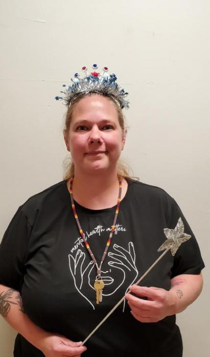 Librarian Tara Engel was crowned queen of the library institute at her last training.