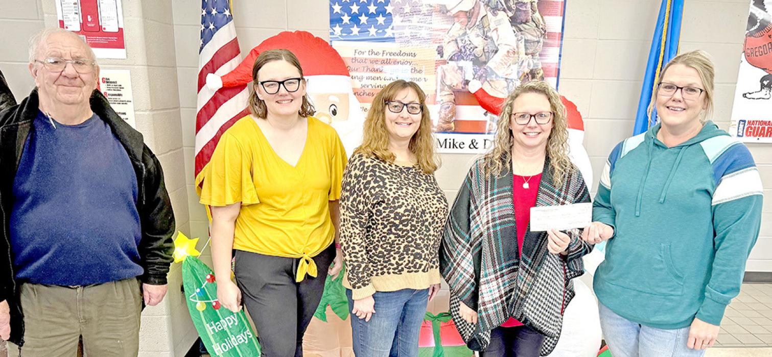 Members of the Gregory &amp; Dallas Chamber of Commerce presented Gregory Public Schools with a $1,000 check to support the upcoming Elementary School Shopping Day. Pictured (from left to right) are chamber members Darold Frasch, Ana Leber, and Michelle Birkeland; Gregory School Superintendent Sara Anderson; and chamber president Elizabeth VanOverschelde. Not pictured are contributing chamber members Bobbi Reinartz, Dani Bice, Morgan Painter, and JMe Braun. (Submitted photo)