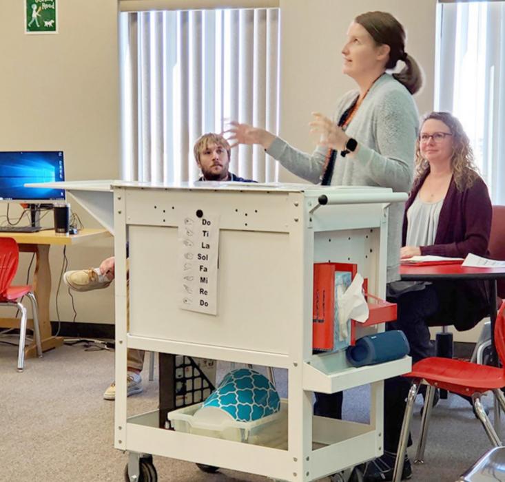 Gregory School District K-12 music teacher demonstrates her traveling classroom to the school board.