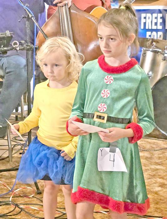 A girl minion and an elf were two of the winners in the children’s division of the costume contest at the Halloween Dance and Masquerade Ball at Carlock Saturday night. The crowd had tough choices picking the winners from the numerous entries. Win or not, everyone had a great time.