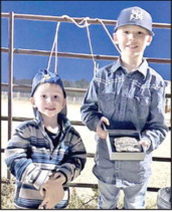 Jace Beck (r) won 1st place in the 5-8 age division (individual). 1st Jace Beck, 2nd Luchese Helkenn, 3rd Tristan Zeisler, 4th Copen Lunne. Layke Beck, (l) won 3rd place in the 0-4 age division.