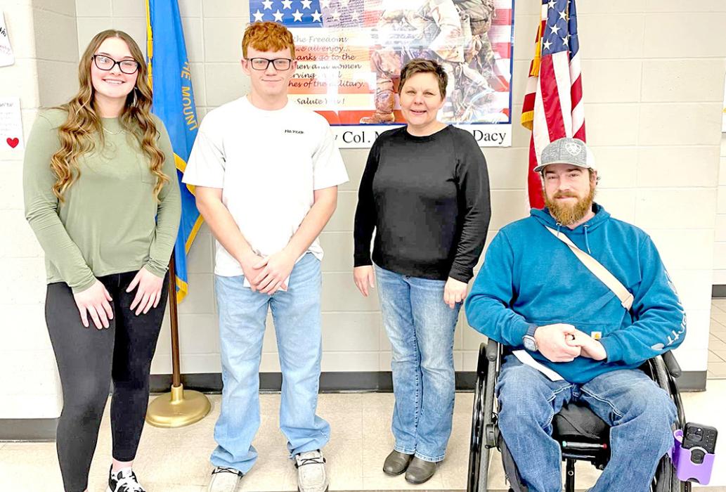 Jung is shown here with, l to r, Zach Wheeler, accepting on behalf of his father Dan Wheeler, Amy Juracek, and Justin Weise.