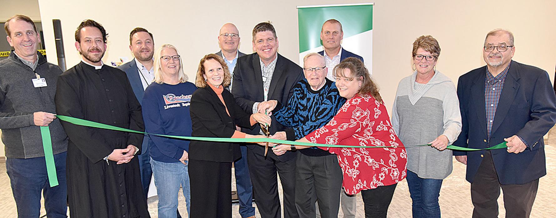 Avera executives, Gregory hospital board members, and clergy were on hand for the new health care facility’s ribbon cutting on Thursday. Shown l to r: Dave Flicek, Fr. Jonathan Dillon, Steve Tappe, Laura Petersen, Kimberly Veskrna, Bob Sutton, Tony Timanus, Emmett Kotrba, Dr. Kevin Post, Sandi Karl, Cheryl Sperl, and Dr. Rich Kafka.