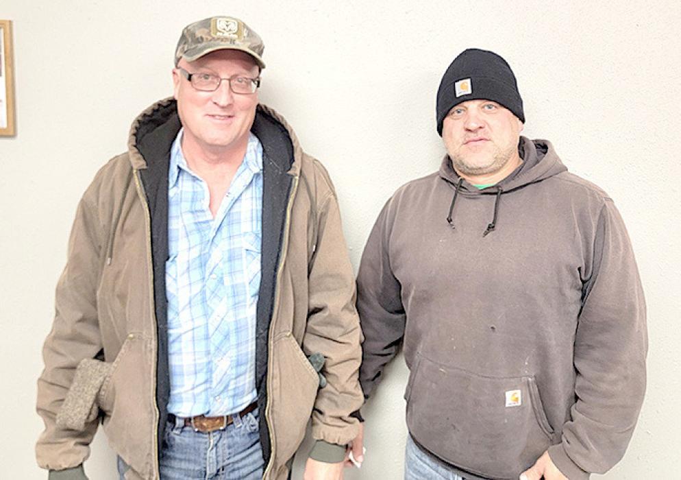 Lyle Haney, left, was recognized for 35 years of service with the Gregory Volunteer Fire Department. Justin Keegan, right, was honored for ten years.