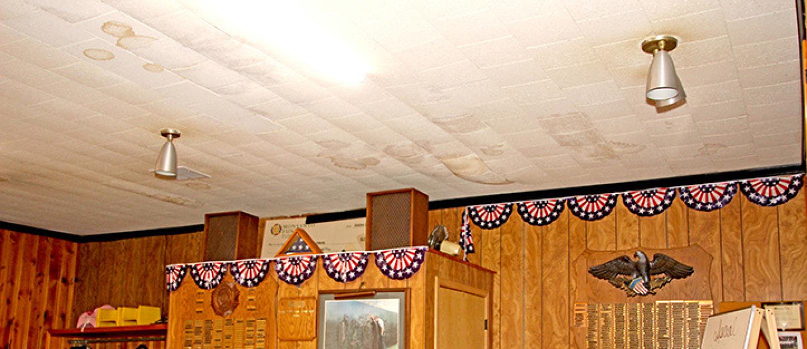 Roof leaks have caused unsightly damage to ceilings in the Legion building.