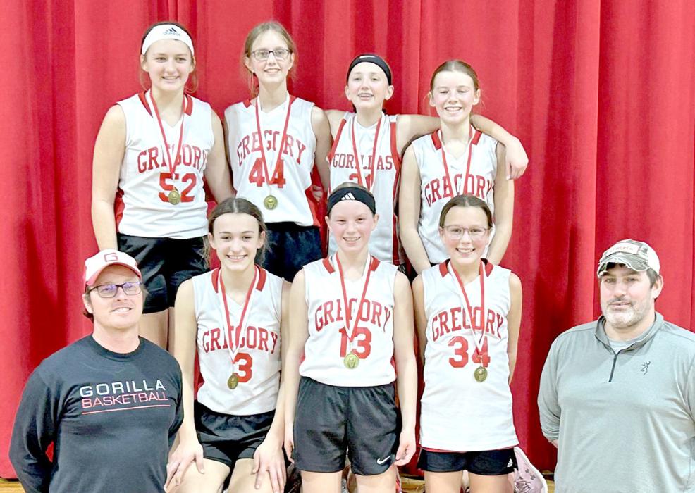Gregory sixth grade girls basketball won first place at the home tournament on Saturday, January 17, 2026. Back row (l to r): Addyson DuFrane, Hannah Hull, Mayme Reber, and Avery Stukel.Front row (l to r): Coach Hank Wonnenberg, Avaya Vomacka, Lydia Wonnenberg, Sutton Braun, and Coach Aaron Vomacka.